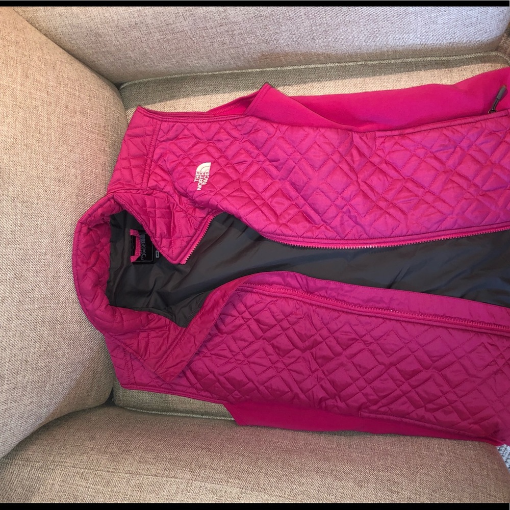 The North Face pink puffer vest